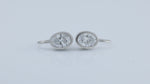 Load and play video in Gallery viewer, Matte Bezel Oval Cut Lab Diamond Dangle Earrings with Lab Blue Sapphire Hidden Halo
