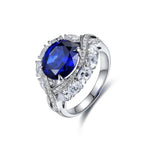 Lade Bild in die Galerieansicht, Twist Band 4.8 Ct Lab Blue Sapphire Engagement Ring - LGG Jewelry